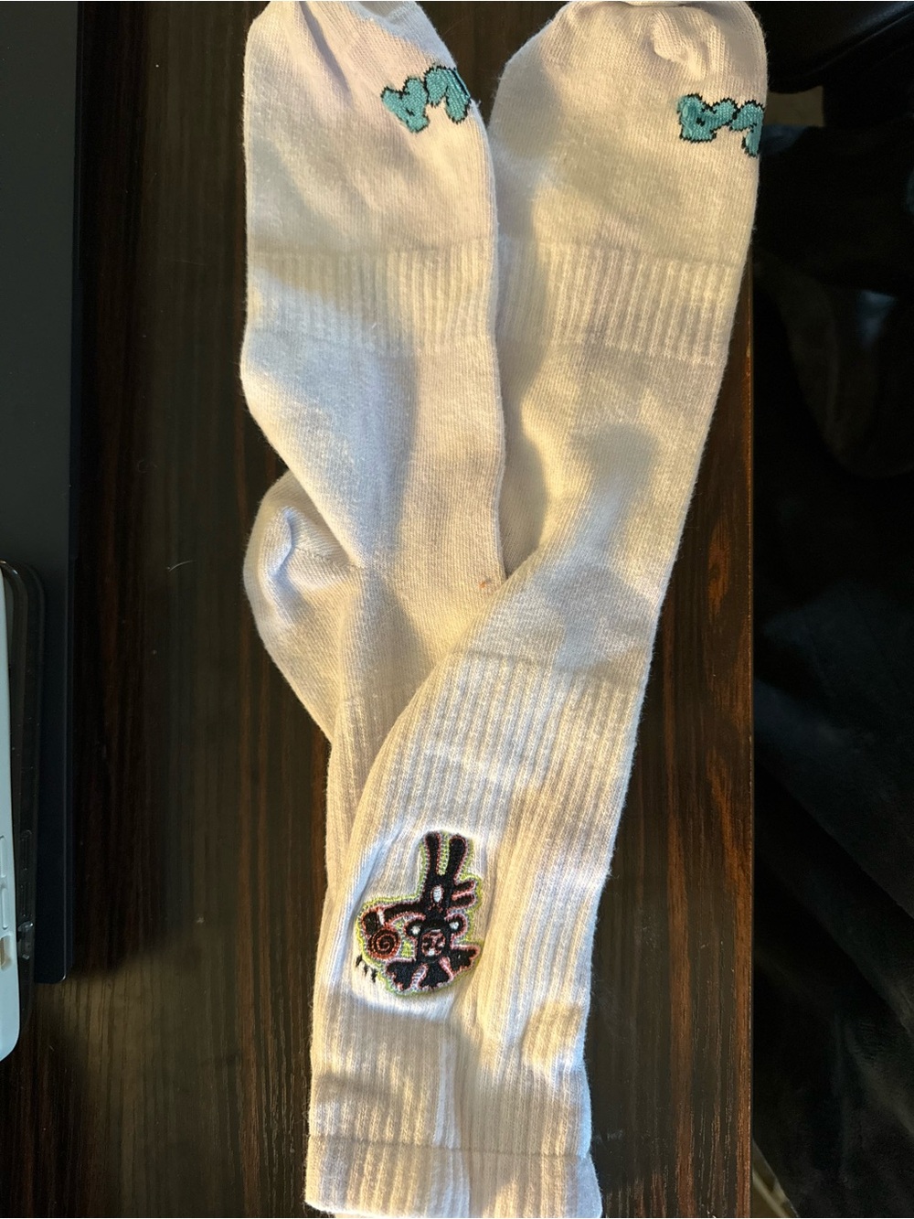 Lollapoolza White Crew Socks with Teal Accent and Character Patch